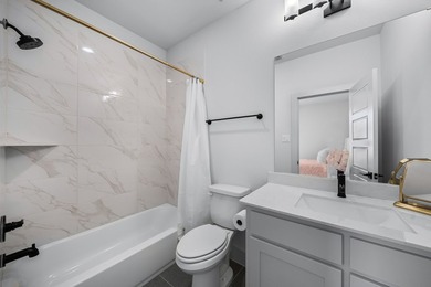 Experience modern luxury in this stunning Perry Home located in - photo 26