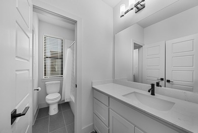 Experience modern luxury in this stunning Perry Home located in - photo 28