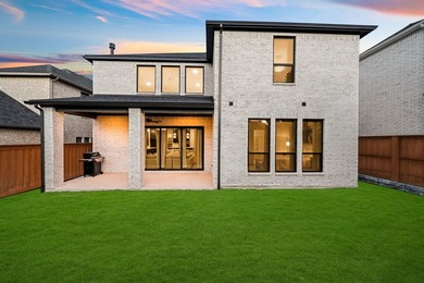 Experience modern luxury in this stunning Perry Home located in - photo 31