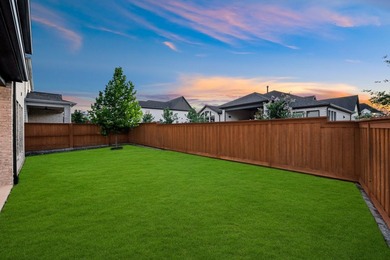 Experience modern luxury in this stunning Perry Home located in - photo 33