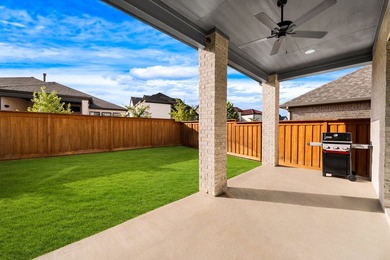 Experience modern luxury in this stunning Perry Home located in - photo 34