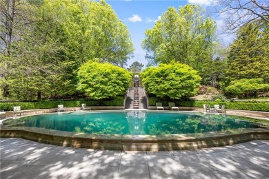 Hidden beyond a gated, winding drive in the heart of - photo 3