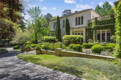 Hidden beyond a gated, winding drive in the heart of - photo 4