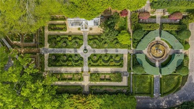 Hidden beyond a gated, winding drive in the heart of - photo 5