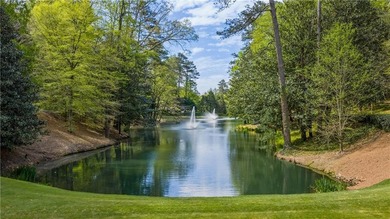 Hidden beyond a gated, winding drive in the heart of - photo 6