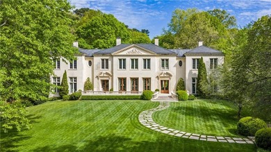Hidden beyond a gated, winding drive in the heart of - photo 7