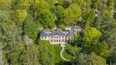 Hidden beyond a gated, winding drive in the heart of - photo 8