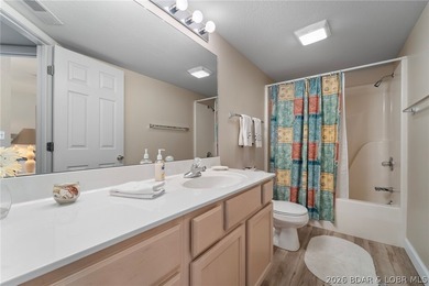 Walk-in level lakefront living in sought-after Bristol Bay! This - photo 19