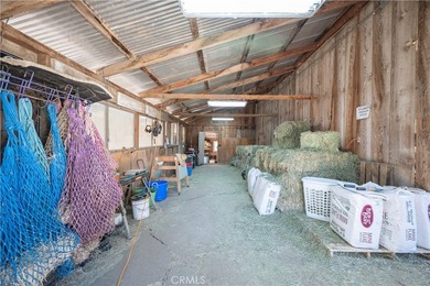 Welcome to 8900 Wight Way, a rare equestrian retreat designed - photo 13