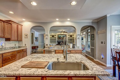Perfect for entertainers alike, this beautiful all brick home - photo 18