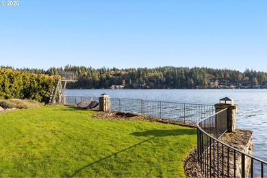 One of Oswego Lake's iconic waterfront homes, this custom estate - photo 4