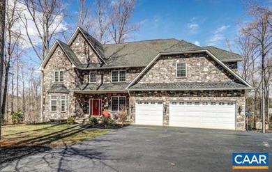 Experience lakefront living at its finest on the private side of - photo 1