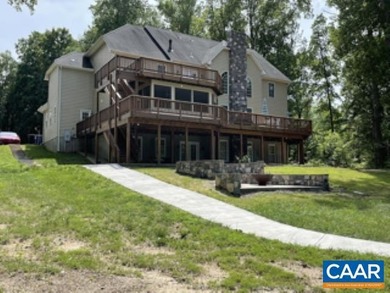 Experience lakefront living at its finest on the private side of - photo 2