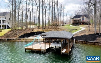 Experience lakefront living at its finest on the private side of - photo 3