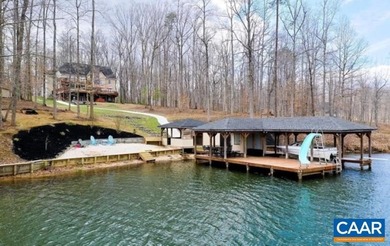 Experience lakefront living at its finest on the private side of - photo 4