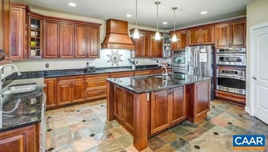 Experience lakefront living at its finest on the private side of - photo 8
