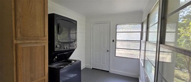 This cozy 1-bed, 1-bath updated camp house offers a serene - photo 11