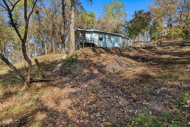 This cozy 1-bed, 1-bath updated camp house offers a serene - photo 24