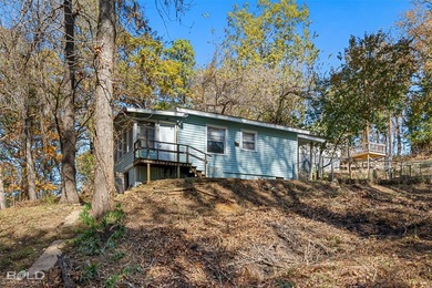 This cozy 1-bed, 1-bath updated camp house offers a serene - photo 25