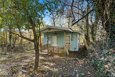 This cozy 1-bed, 1-bath updated camp house offers a serene - photo 30