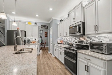 Welcome to this exceptional 6-bedroom, 3.5-bath home nestled on - photo 11