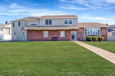 NASSAU SHORES! NO FLOOD! 3746 sqft updated 7 bedroom, 4.5 bath - photo 1