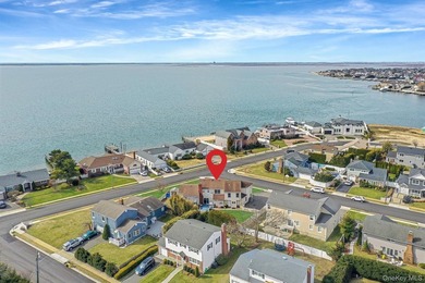 NASSAU SHORES! NO FLOOD! 3746 sqft updated 7 bedroom, 4.5 bath - photo 2