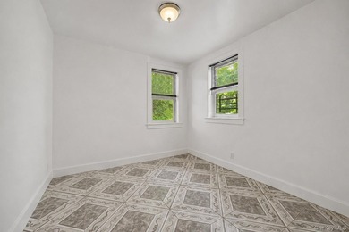 Welcome to this well-configured two-family home in the heart of - photo 15