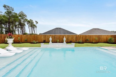Resort-style living starts in the backyard of this beautifully - photo 20