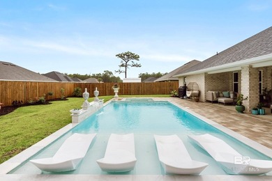 Resort-style living starts in the backyard of this beautifully - photo 21