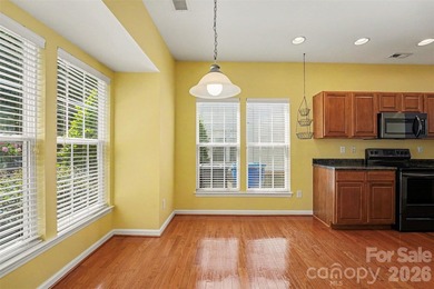 FRESH PAINT!!! If you're looking for a charming townhome in a - photo 3