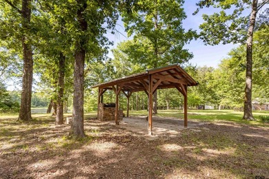 Experience the perfect blend of privacy, comfort, and East Texas - photo 41