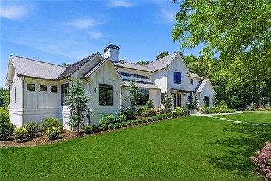 Nestled on 1.34 beautifully landscaped and fully fenced acres in - photo 2
