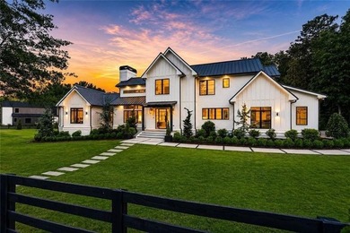 Nestled on 1.34 beautifully landscaped and fully fenced acres in - photo 3