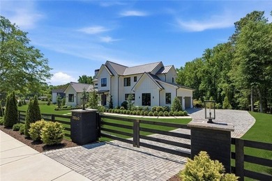 Nestled on 1.34 beautifully landscaped and fully fenced acres in - photo 4