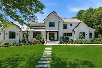 Nestled on 1.34 beautifully landscaped and fully fenced acres in - photo 5