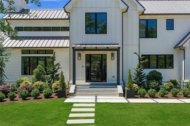 Nestled on 1.34 beautifully landscaped and fully fenced acres in - photo 6