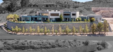 Perched on a prime .52 acre hillside estate overlooking Lake - photo 1