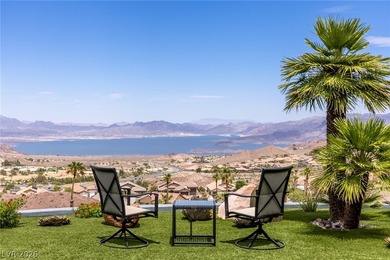 Perched on a prime .52 acre hillside estate overlooking Lake - photo 3