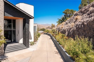 Perched on a prime .52 acre hillside estate overlooking Lake - photo 8
