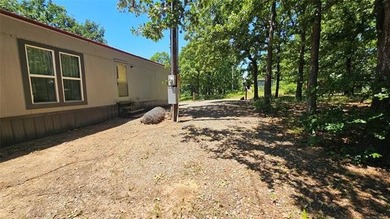 This well-maintained, turn-key 1996 mobile home features 3 - photo 16