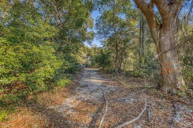 Prime development opportunity on 0.64 acres featuring four - photo 7