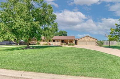 Welcome to 517 Garrett Street in Elk City, Oklahoma - a charming