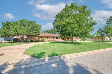 Welcome to 517 Garrett Street in Elk City, Oklahoma - a charming