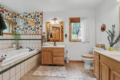 Tucked away in Watersmeet, MI, just north of the border, you'll - photo 17
