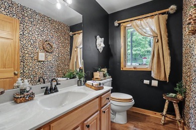 Tucked away in Watersmeet, MI, just north of the border, you'll - photo 19