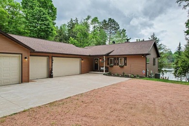 Tucked away in Watersmeet, MI, just north of the border, you'll - photo 38