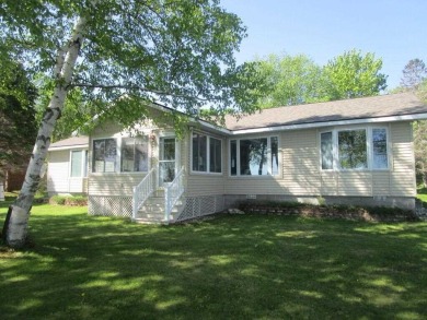 Lake Home For Sale in Carp Lake, Michigan