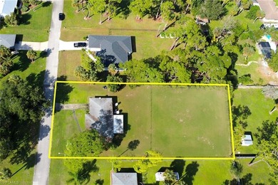 Lake Home For Sale in Lehigh Acres, Florida