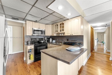 WELCOME TO THIS SPACIOUS 2-BEDROOM, 2-BATH CONDO LOCATED IN THE